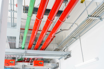 Red Water pipe system. Pumping systems for industrial plants. Construction work. Installation of pipeline extinguishing water in the building. Maintenance of drainage pipes.