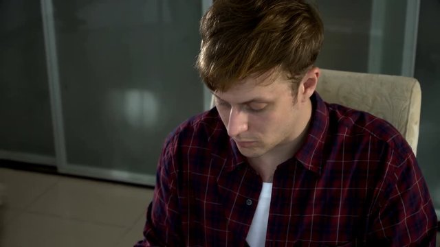 The young freelancer typing on keyboard