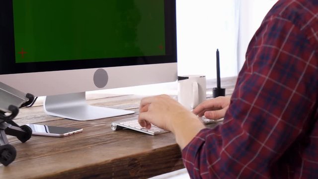 The caucasian male freelance programmer working at home