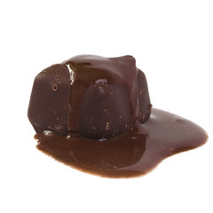one square slice of sweet chocolate candy with chipped chocolate