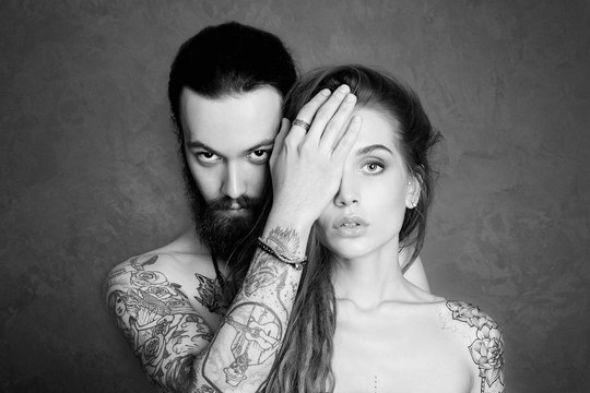 beautiful couple with tattoo.woman and man