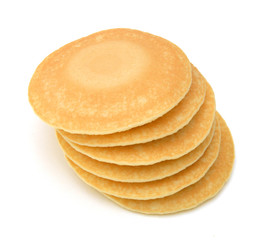 A stack of  plain pancakes on a white background.