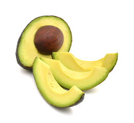 Slice avocado isolated on white.