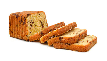 Sliced butter cake on white background