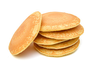 A stack of plain pancakes on a white background.