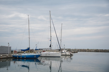 Fototapeta na wymiar Small Yachts at Pier