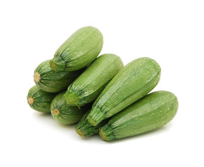 fresh zucchini's on a white background