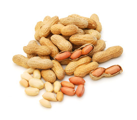 Dried peanuts in closeup on white background