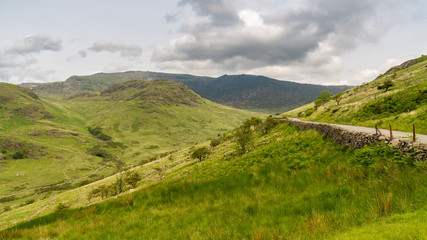 Obraz premium Snowdonia Landscape on the road between Capel Curig and Beddgelert, with the valley of the River Glaslyn, Gwynedd, Wales, UK