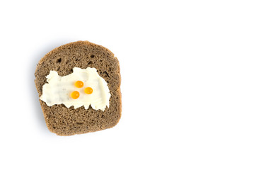 The poor slice of bread with a small amount of butter and red caviar