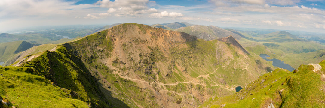 View from the summit of Mount Snowdon, Snowdonia, Gwynedd, Wales, UK - looking north at Garnedd Ugain, the Pyg Track and the Miner's Track
