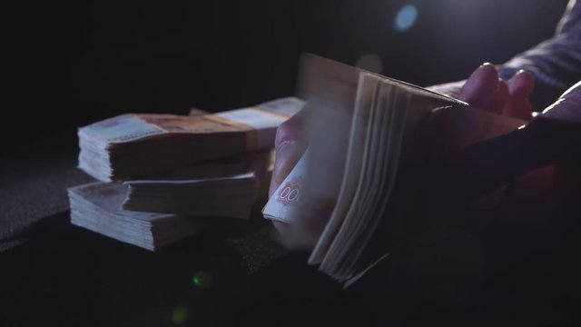 Russian money in dark in smoke