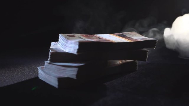 Russian money in dark in smoke