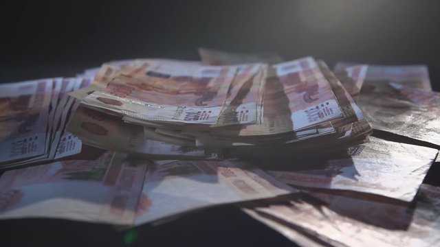 Russian money in dark in smoke