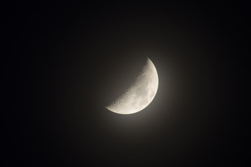 Obraz na płótnie Canvas Half Moon and fog on the night sky.