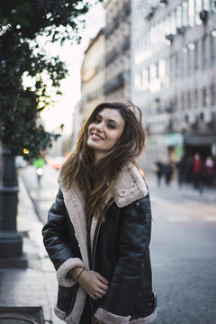Young stylish woman on urban street