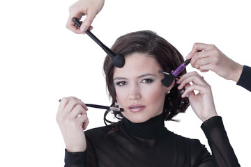 makeup artist deals makeup. isolated on a white background.