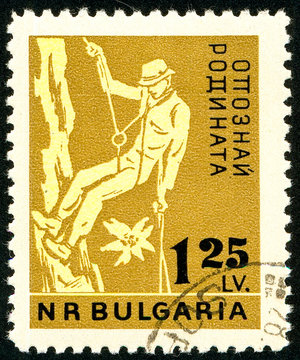 Ukraine - circa 2017: A postage stamp printed in Bulgaria shows drawing Mountaineer. Series: Learn to know your Homeland. Circa 1961.