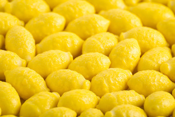   Colorful background of assorted Gumballs isolated over white background