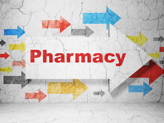 Health concept:  arrow with Pharmacy on grunge textured concrete wall background, 3D rendering