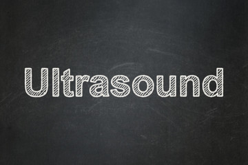 Obraz premium Health concept: text Ultrasound on Black chalkboard background