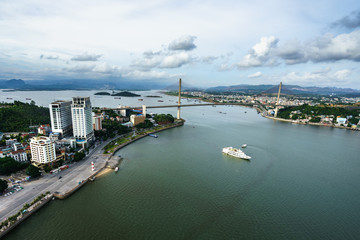 Halong city aerial view with Bai Chay bridge in Quang Ninh province, Vietnam