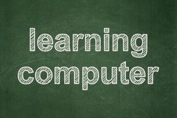 Obraz premium Education concept: text Learning Computer on Green chalkboard background