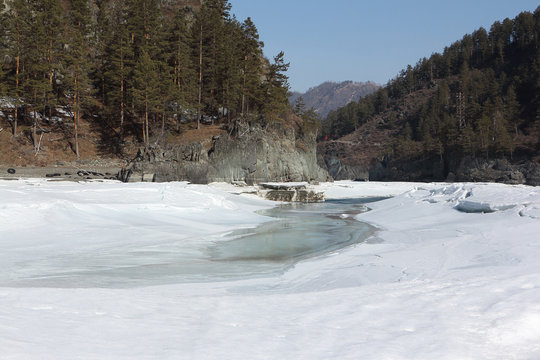 Ice melting in the river in early spring, Katun River, Altai, Russia