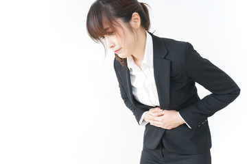 Obraz premium businesswoman suffering from stomachache
