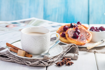 Cottage cheese pancakes with cherry sauce