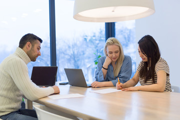 Startup Business Team At A Meeting at modern office building