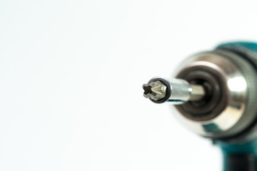 Close up macro shot on screw driver head isolated on white background