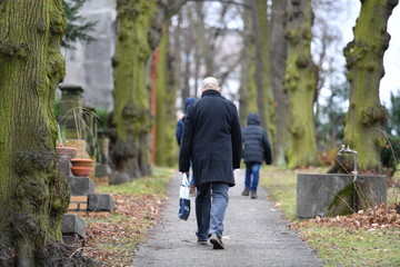 Visitors on a cemetery in Berlin-City