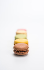 several small macarons of different flavors
