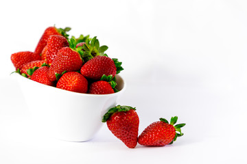 strawberry on white bowl with white background