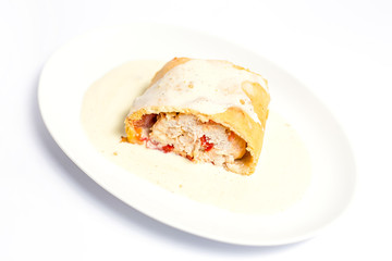 Bacon and cheese filled puff pastry strudels isolated over white background