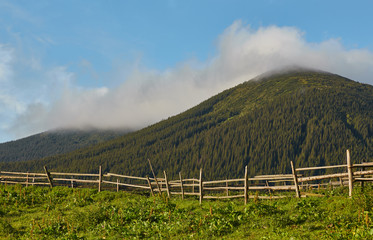 Fototapeta premium Misty dawn in the mountains