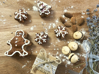 Homemade Gingerbread cookies on wooden background top view