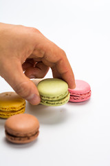 several small macarons of different flavors