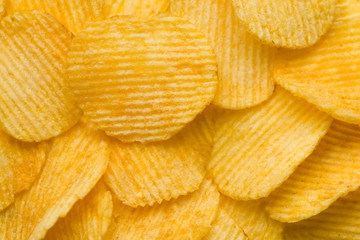 food background potato chips rippled macro shallow dof