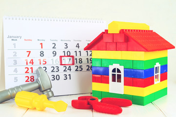 concept calendar January 17 Kid Inventors' Day house of a children's designer and toy tools