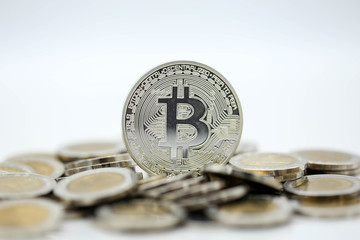 Miniature people : business man standing with bitcoins . success, dealing, greeting ,money , business , partner concept.