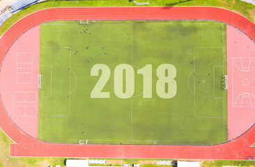Obraz premium 2018 on football grass field background