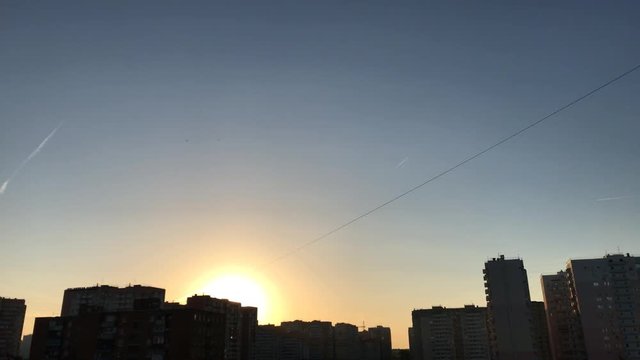 A new day sunrise over sydney cityscape time lapse movements clouds over a bog in city centre, building a sunset with sun, clouds, moning, fly aero ship, time twilight edge lake dramatic sunset clouds