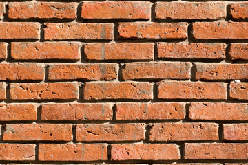 Grunge old red brick pattern textured background.