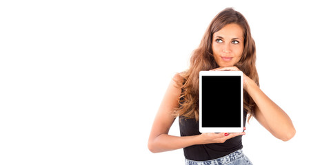 Happy and smiling girl with a tablet. Technology and communication concepts, copy space image