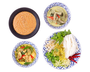Isolated of texture and Popular Thai food, Rice noodle with side dish as green chicken curry in coconut milk with winter melon and fish curry in coconut milk with herb .