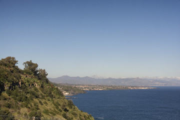 Fototapeta na wymiar partial view of the Ionian coast near Acireale in Sicily