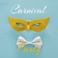 Top view image of masquerade venetian mask background. Flat lay.