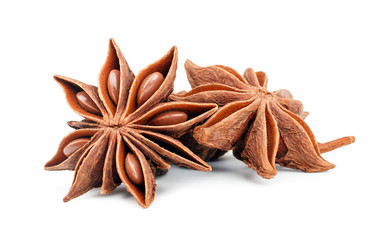 Star anise spice fruits and seeds isolated on white background closeup - Powered by Adobe